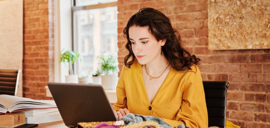 woman working on a laptop