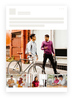 Two business professionals discuss while pushing a bike